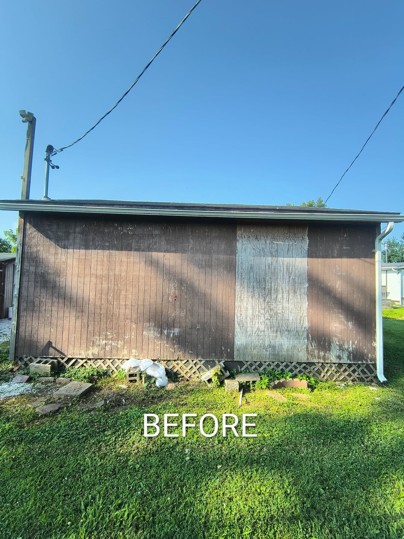 Shed siding before painting, weathered and stained